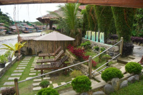 Гостиница Junia Guesthouse Bukit Lawang  Bohorok